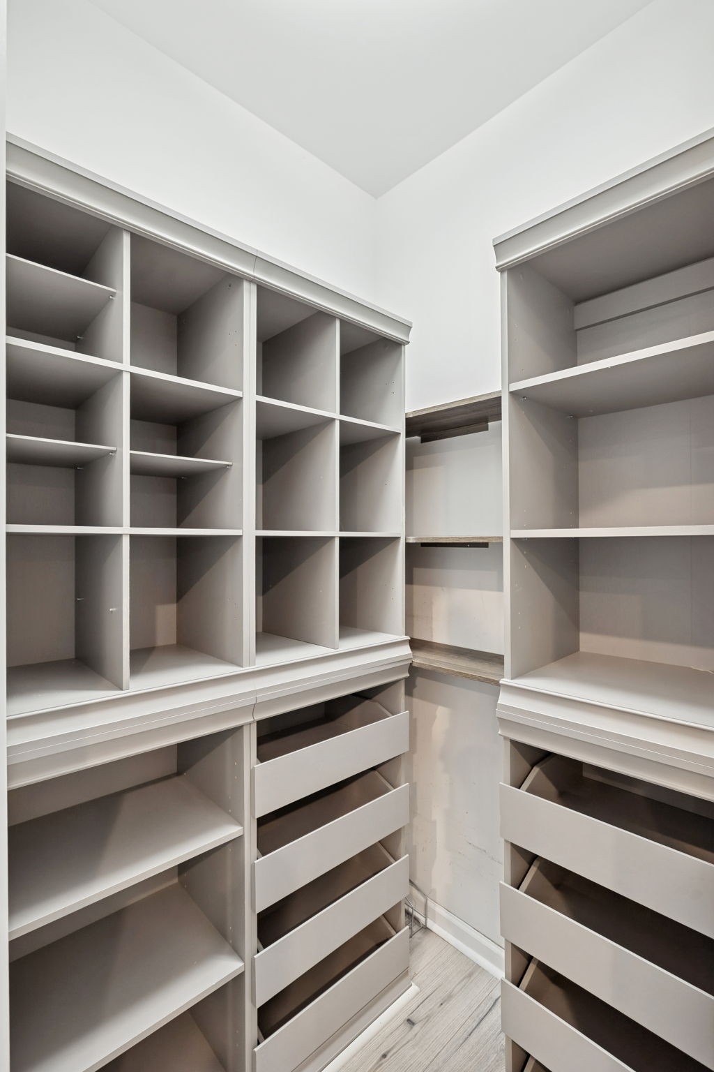 7027 Hickman Way Spring Hill, TN 37174 - Photo 19 of 61 a view of walk in closet with empty racks