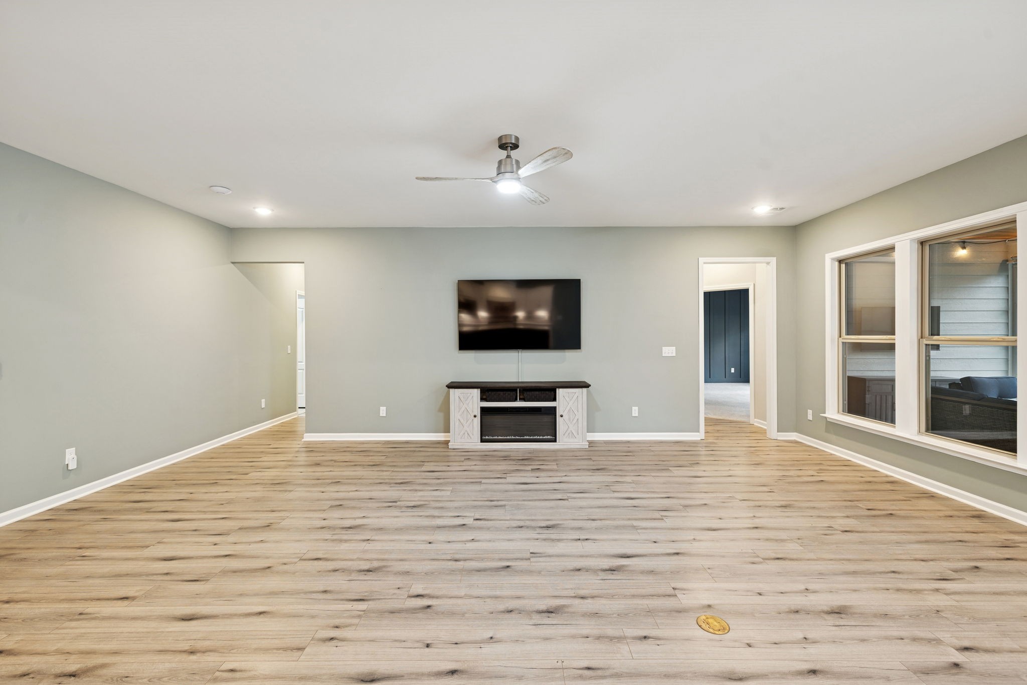 7027 Hickman Way Spring Hill, TN 37174 - Photo 23 of 61 a view of a livingroom with a flat screen tv