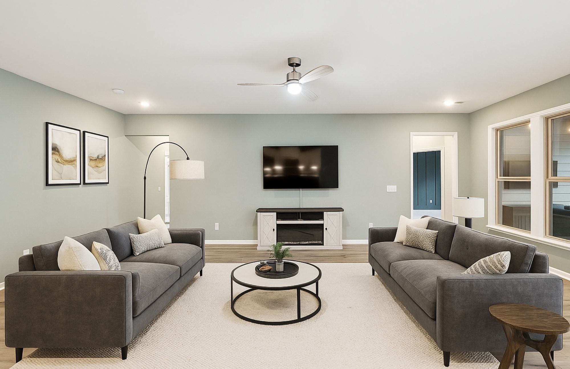 7027 Hickman Way Spring Hill, TN 37174 - Photo 24 of 61 a living room with furniture potted plant and a fireplace