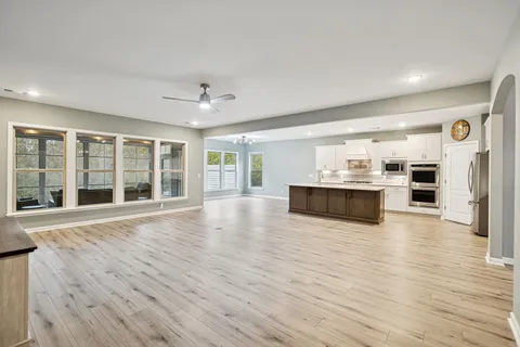 a bathroom with a double vanity sink and mirror