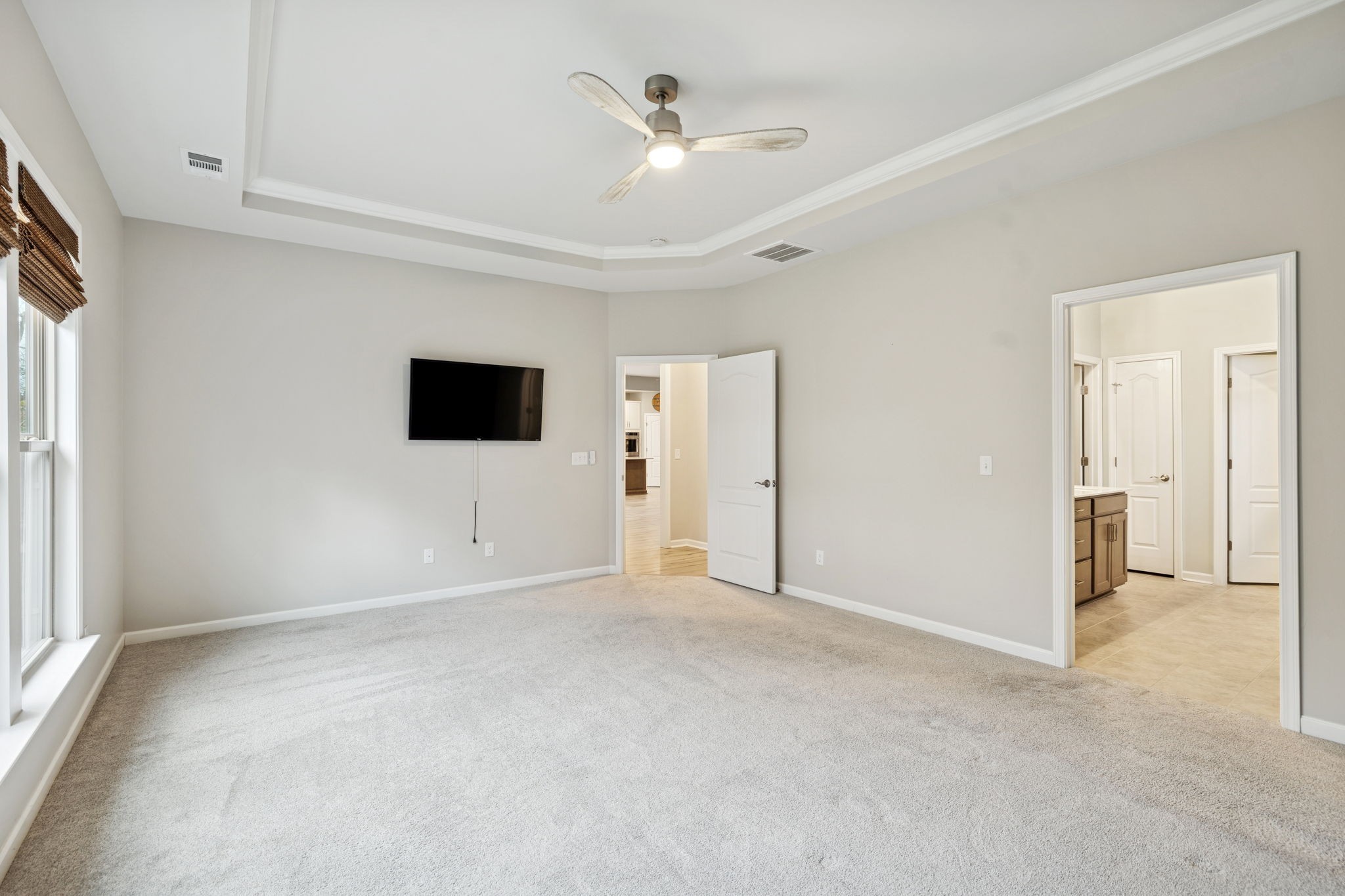 7027 Hickman Way Spring Hill, TN 37174 - Photo 29 of 61 a view of an empty room with a ceiling fan