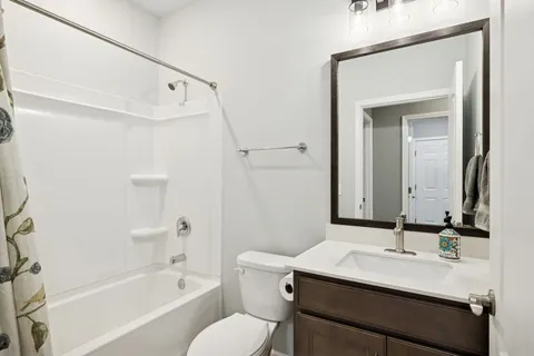 a outdoor living space with patio furniture and a window