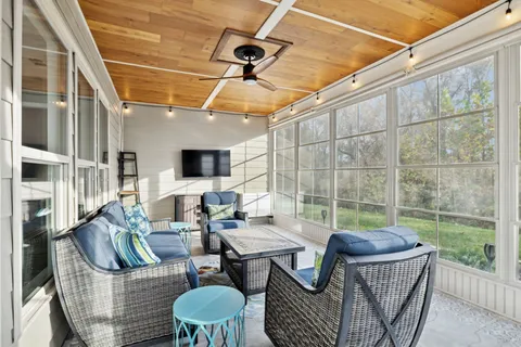 a view of a backyard with pathway