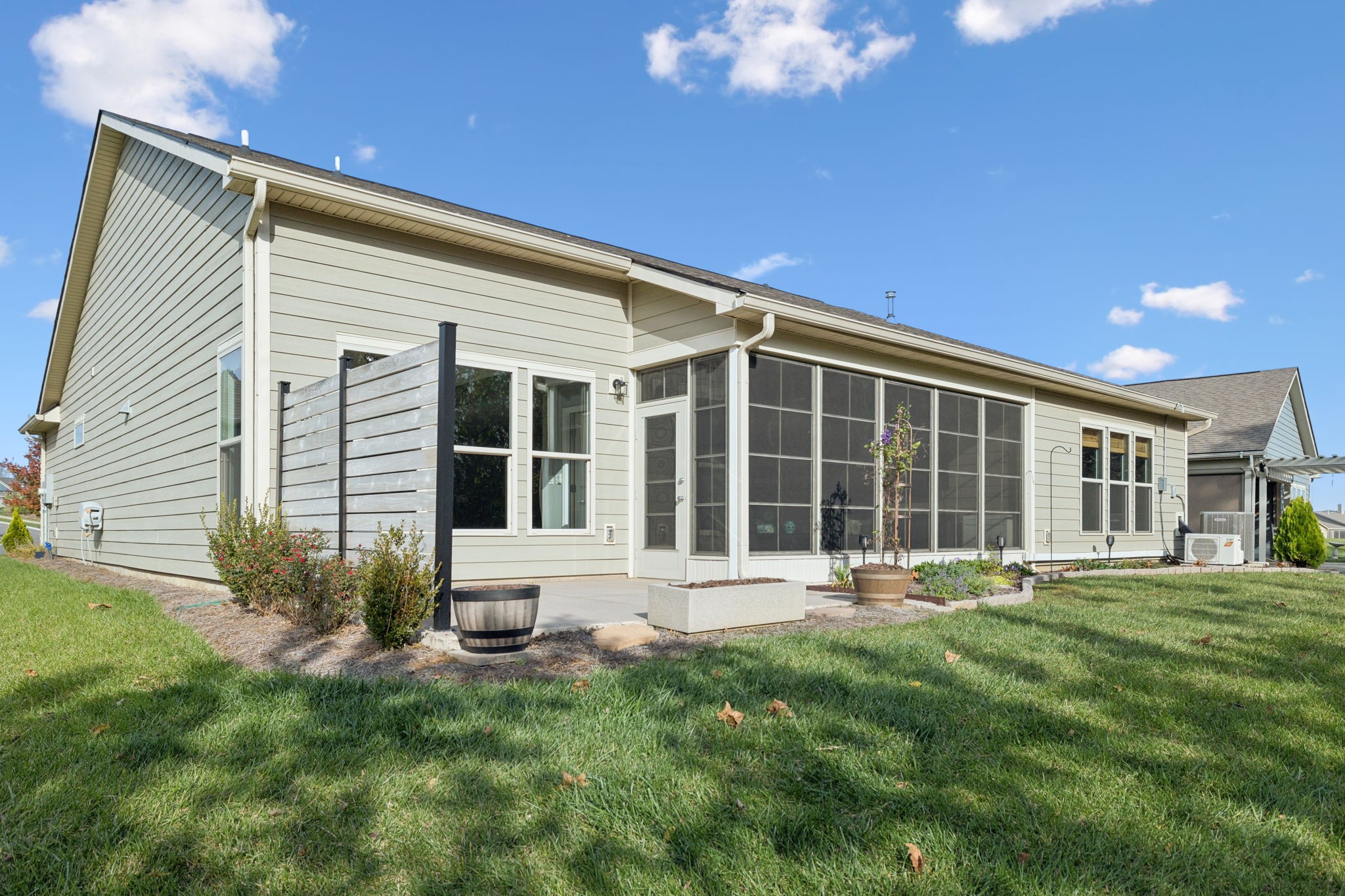7027 Hickman Way Spring Hill, TN 37174 - Photo 50 of 61 a front view of a house with a yard and outdoor seating