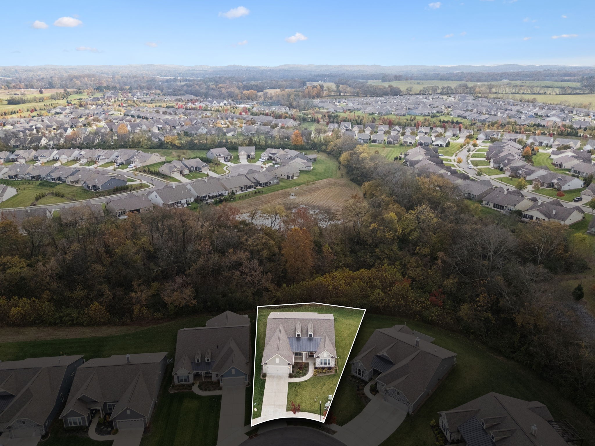 7027 Hickman Way Spring Hill, TN 37174 - Photo 56 of 61 an aerial view of a city with lots of residential buildings