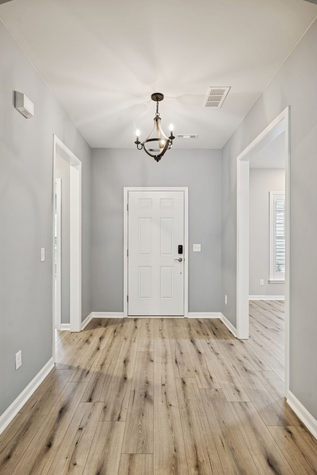 7027 Hickman Way Spring Hill, TN 37174 - Photo 6 of 61 a view of room with wooden floor and ceiling fan