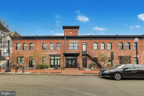 a car parked in front of a building
