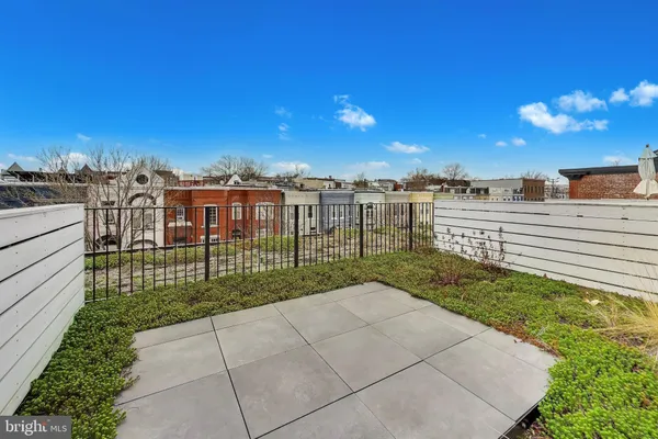 a view of a terrace with a yard