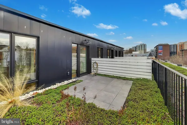a view of a porch in front of house