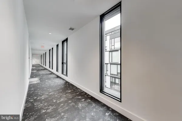 a view of hallway with stairs
