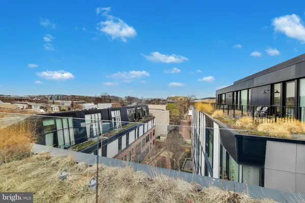 a living room with fireplace furniture and a flat screen tv