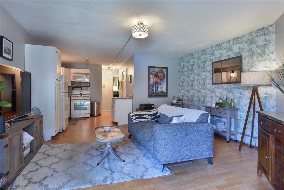 3940 Post Road, Unit 2 Warwick, RI 02886 - Photo 8 of 14 Open concept living/kitchen.