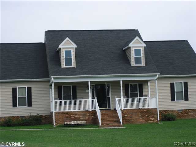 1901 Coxtown Road Crozier, VA 23039 - Photo 8 of 8 a front view of a house with a yard