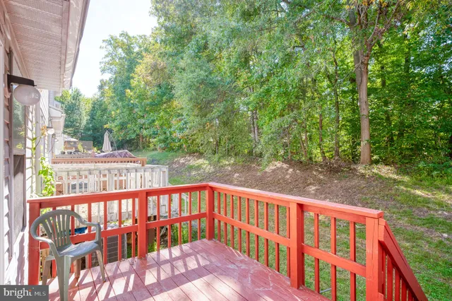 a view of a balcony with trees