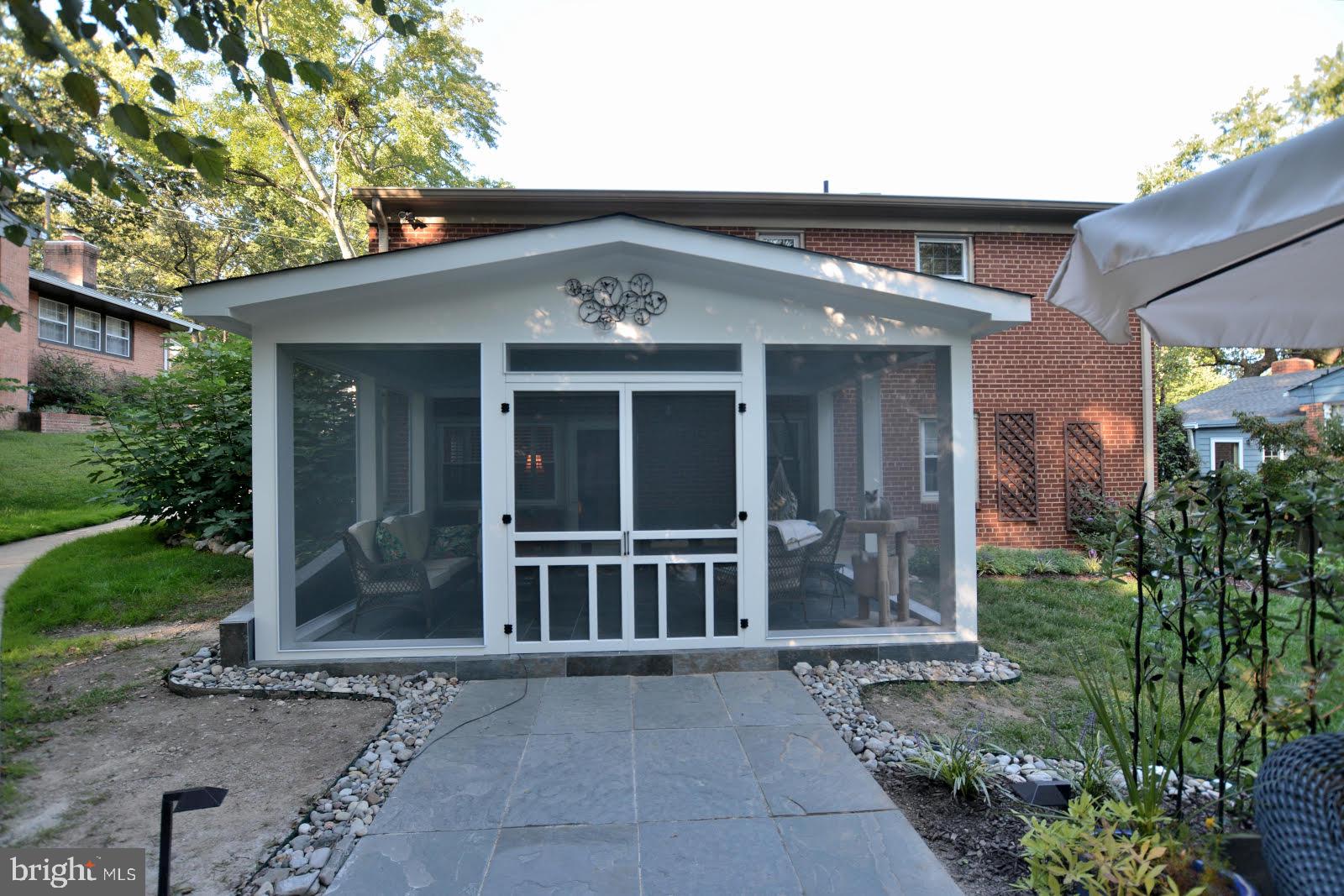 1129 Cameron Road Alexandria, VA 22308 - Photo 33 of 37 Screened Porch Leads to Brick Patio
