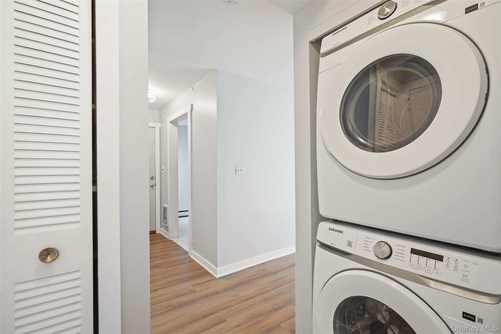 9 C Kings Court, Unit C Mohegan Lake, NY 10547 - Photo 17 of 31 a view of a hallway with washer and dryer