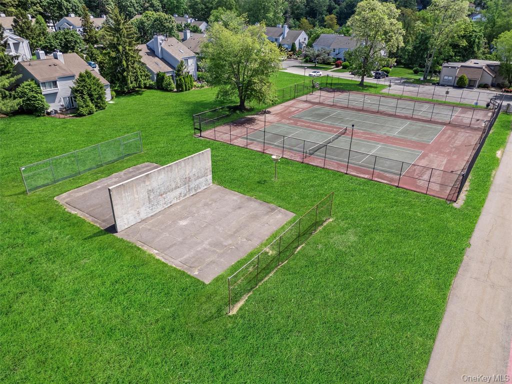 9 C Kings Court, Unit C Mohegan Lake, NY 10547 - Photo 27 of 31 a view of a backyard with a garden