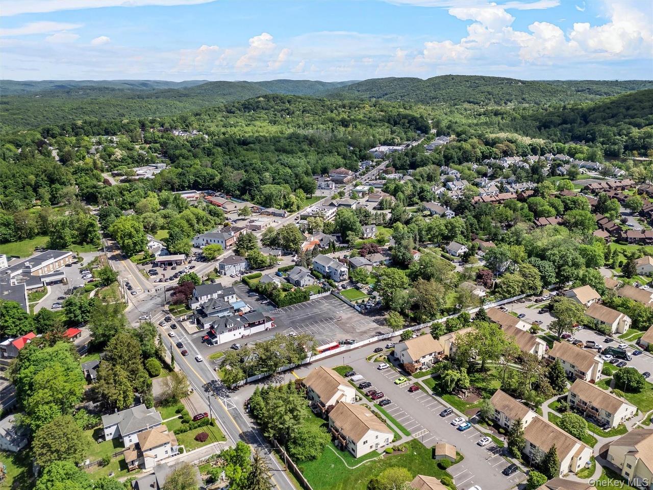 9 C Kings Court, Unit C Mohegan Lake, NY 10547 - Photo 28 of 31 an aerial view of a city with lots of residential buildings