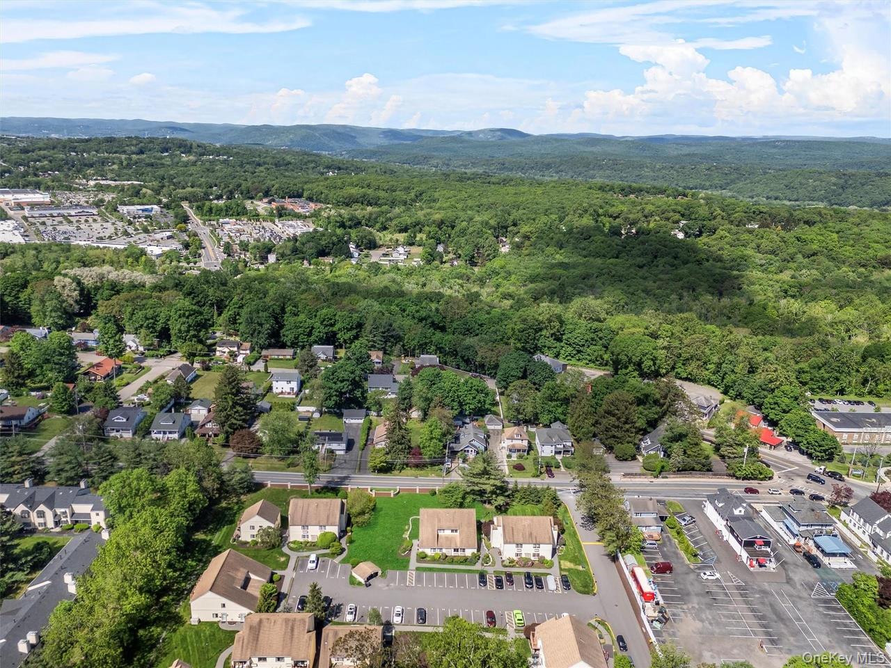 9 C Kings Court, Unit C Mohegan Lake, NY 10547 - Photo 30 of 31 a view of a city with a mountain