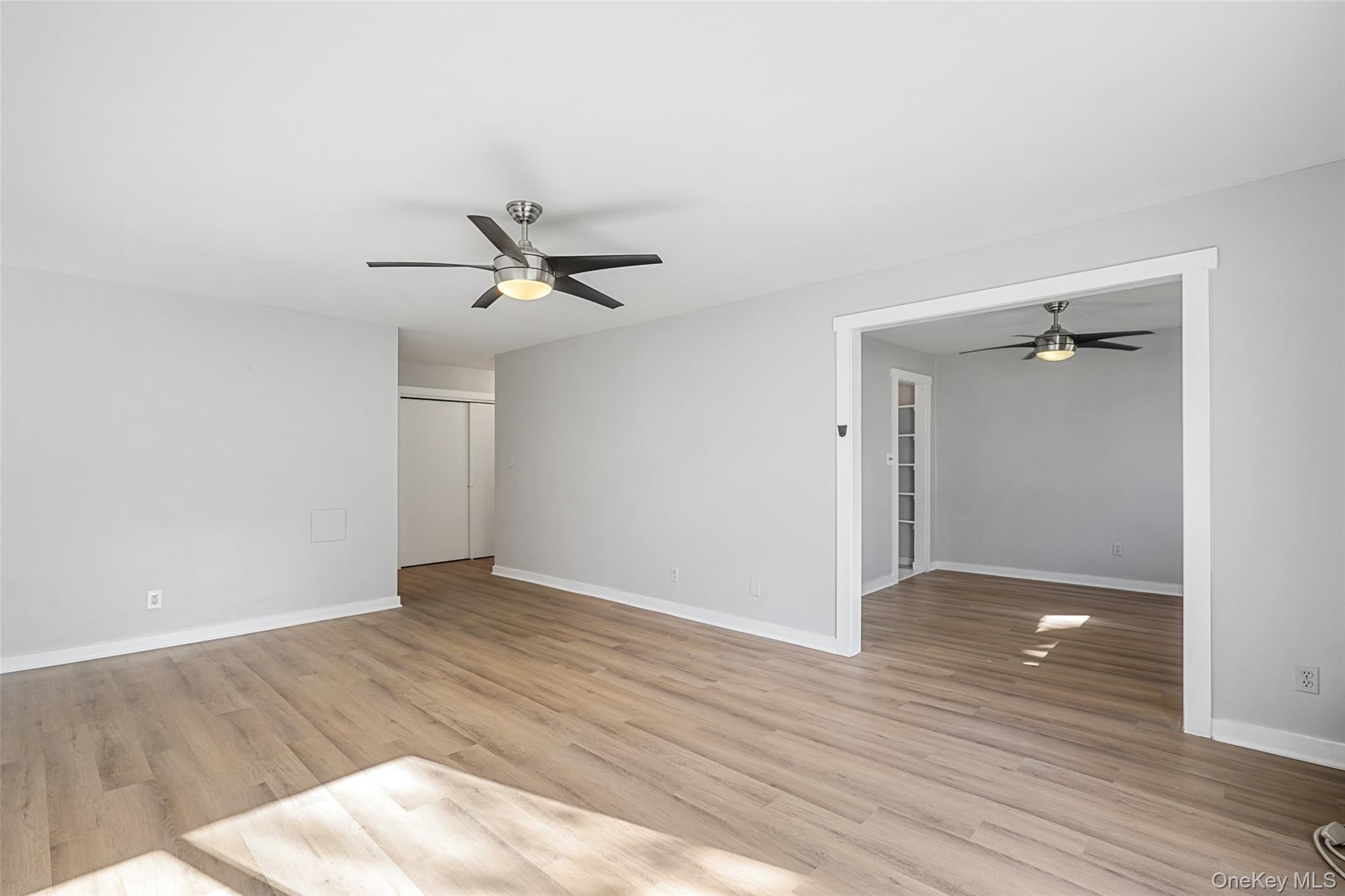 9 C Kings Court, Unit C Mohegan Lake, NY 10547 - Photo 3 of 31 wooden floor in an empty room