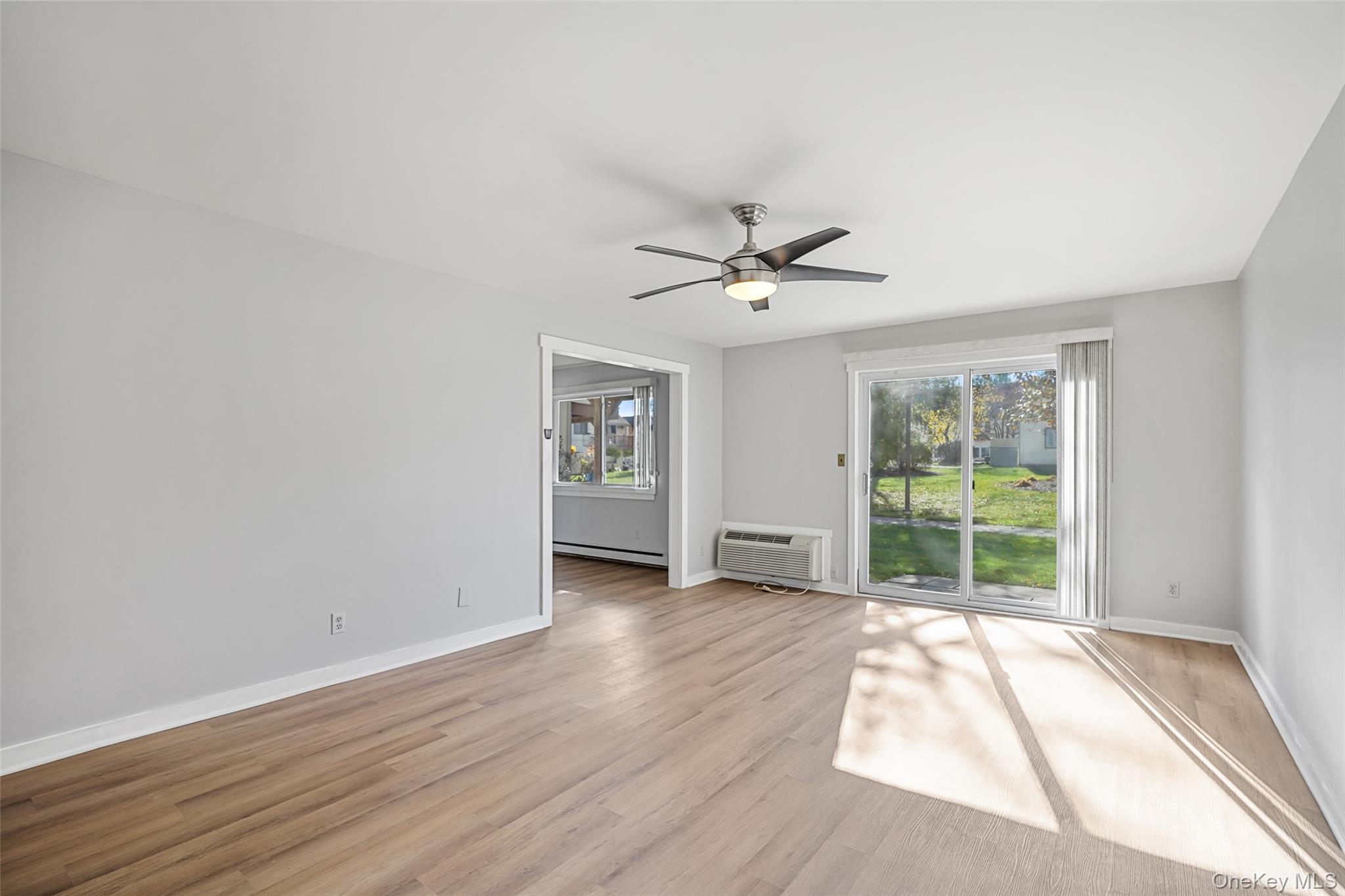 9 C Kings Court, Unit C Mohegan Lake, NY 10547 - Photo 4 of 31 a view of an empty room with a window