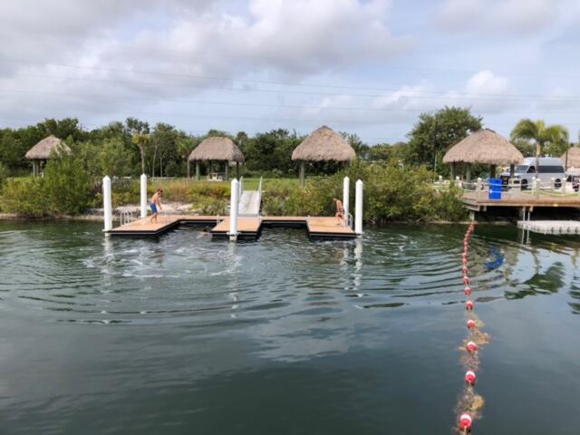 231 Pelican Lane Big Pine Key, FL 33043 - Photo 5 of 11 a view of lake with boats and trees