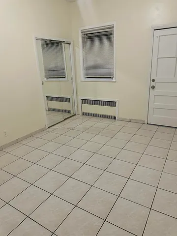 a bathroom with a toilet a sink and a shower