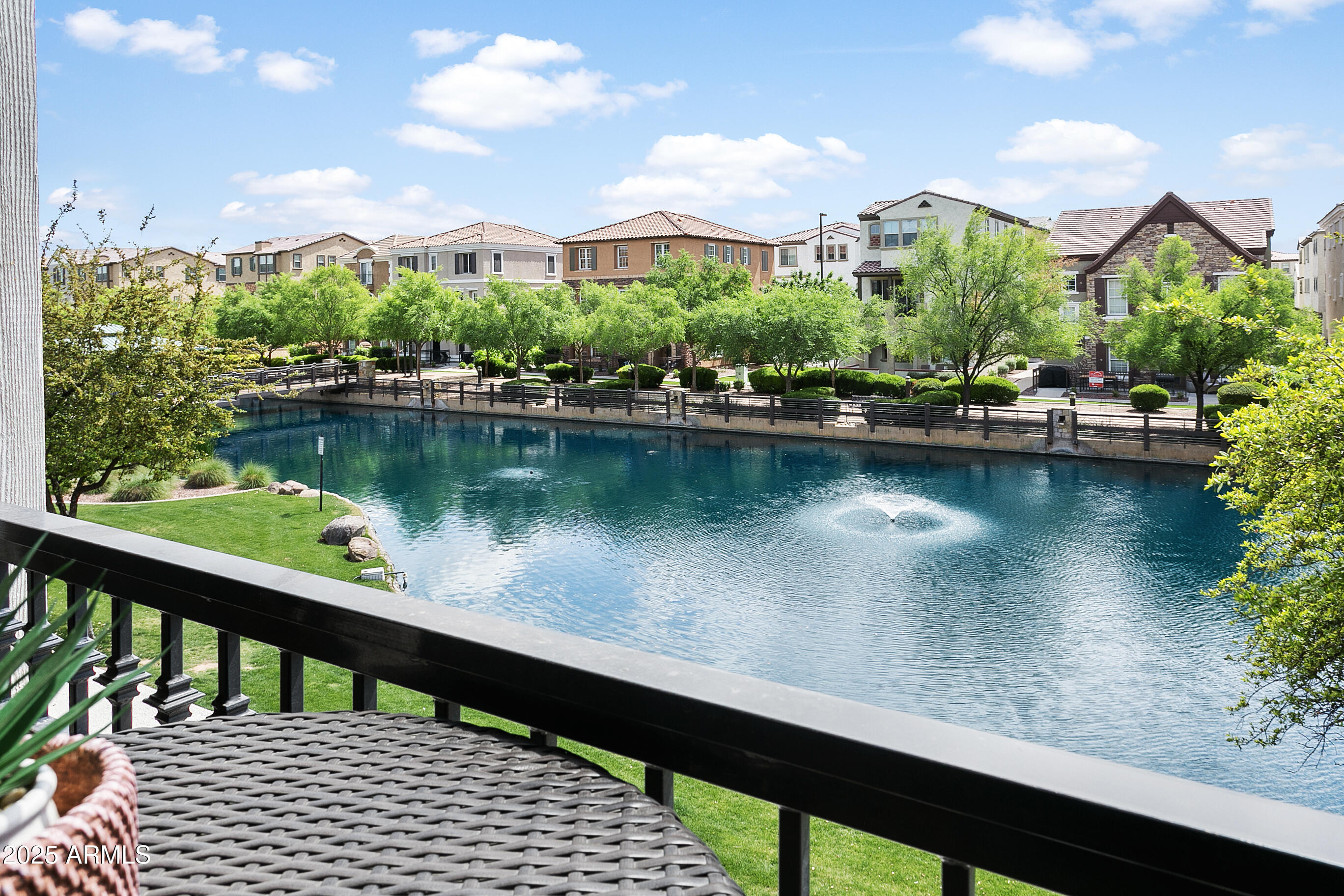 1661 East Hampton Lane Gilbert, AZ 85295 - Photo 13 of 31 a view of a lake with a garden