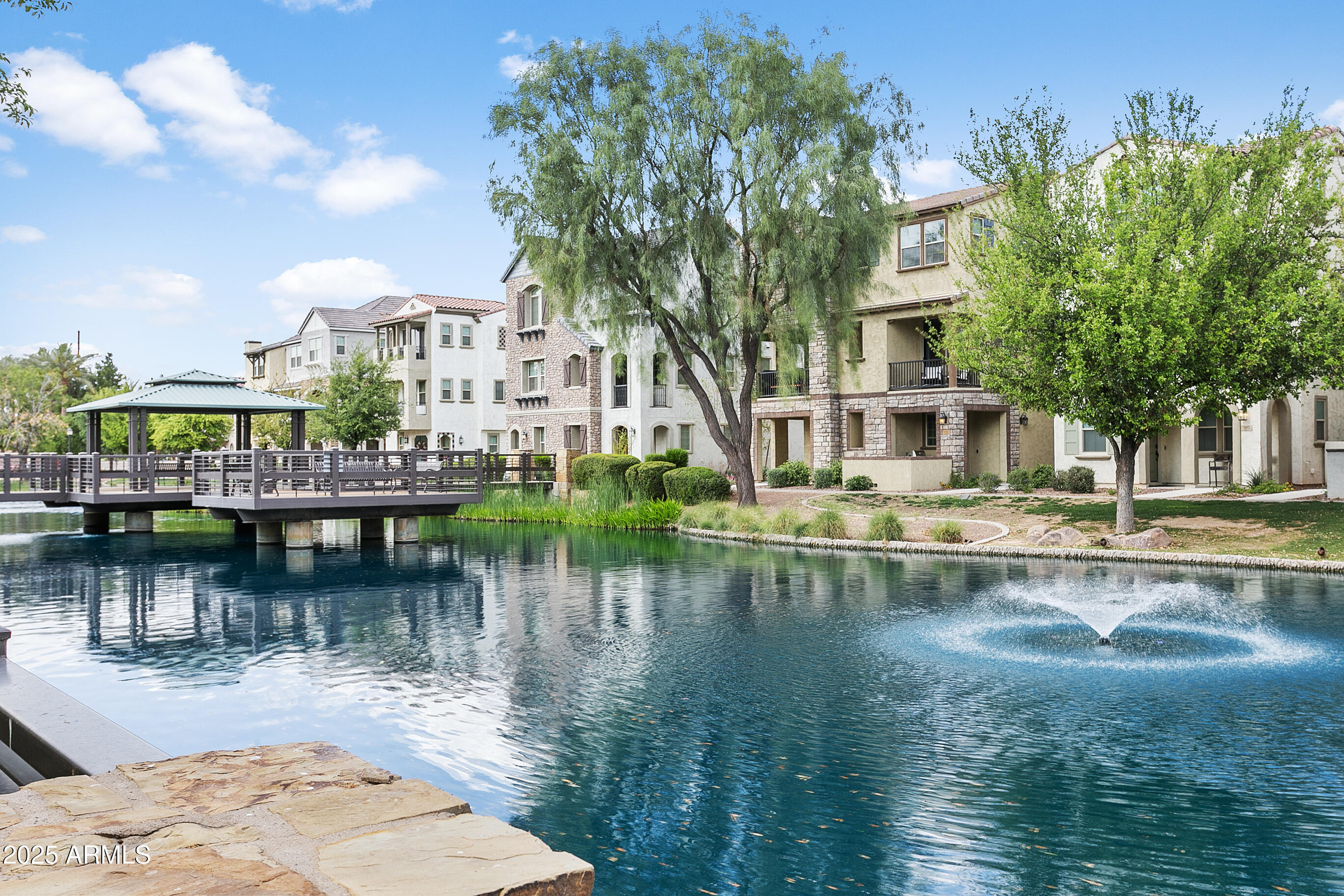 1661 East Hampton Lane Gilbert, AZ 85295 - Photo 26 of 31 a view of a lake with houses