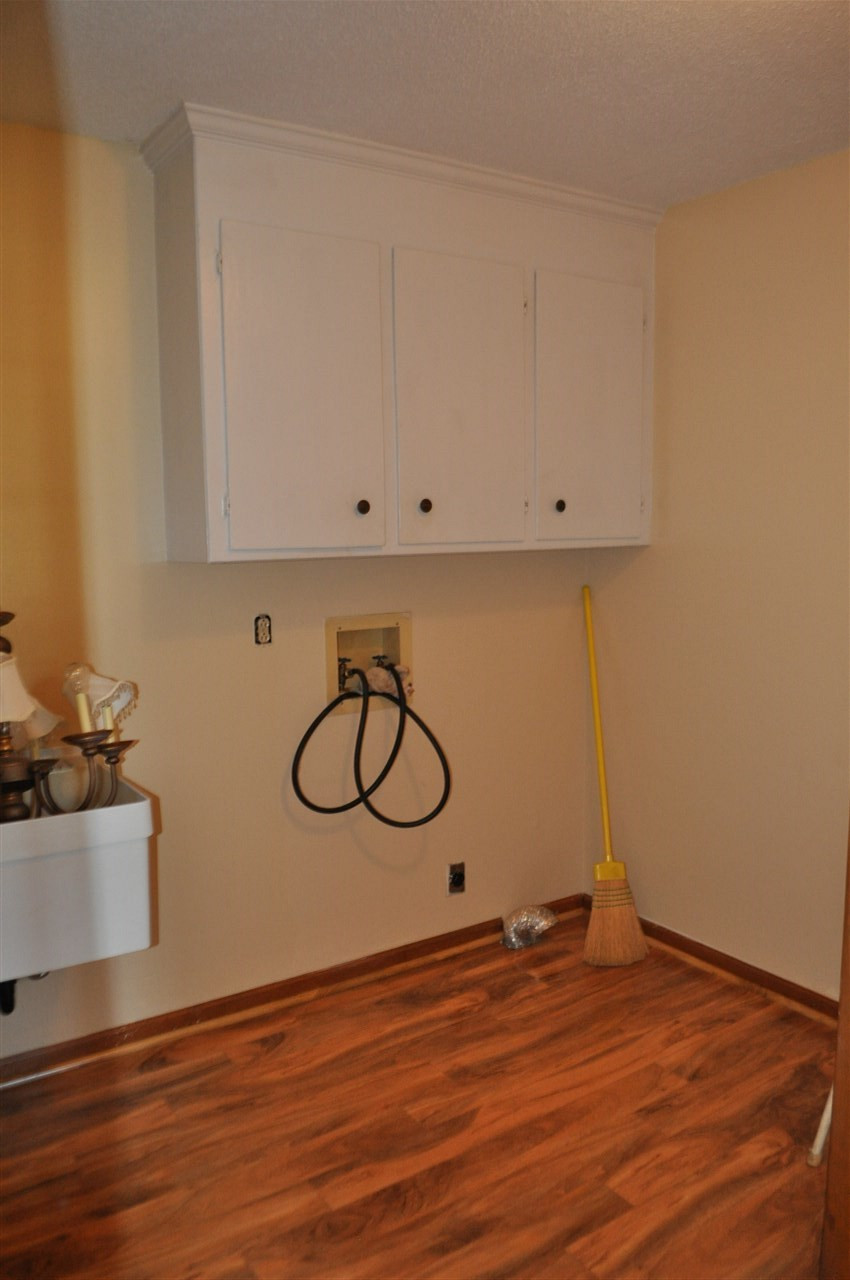 5616 Cleveland Road Clayton, NC 27520 - Photo 8 of 21 Large laundry room with utility sink