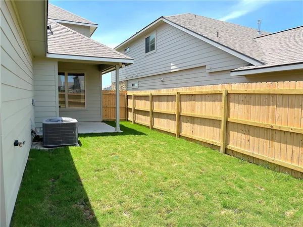 a view of a backyard with a garden
