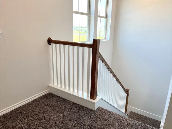 a view of a hallway with window