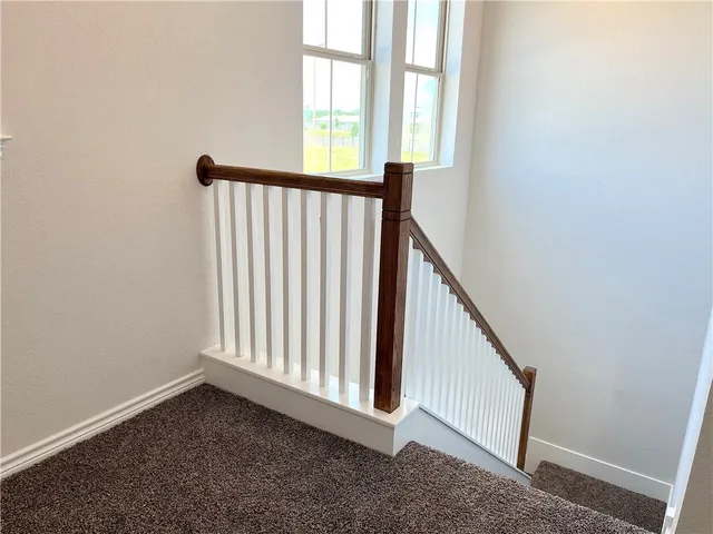 a view of a hallway with window