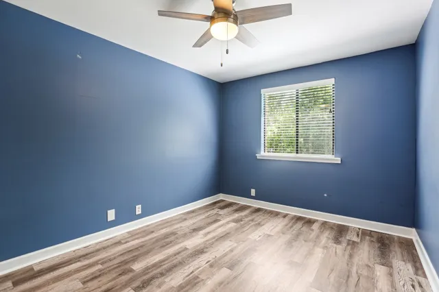 a bathroom with a shower and a toilet