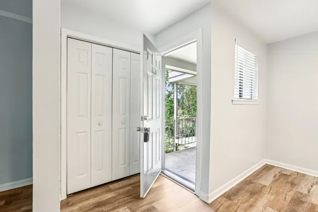 a view of entryway with wooden floor