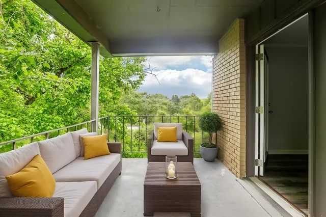 a view of a yard with an outdoor space