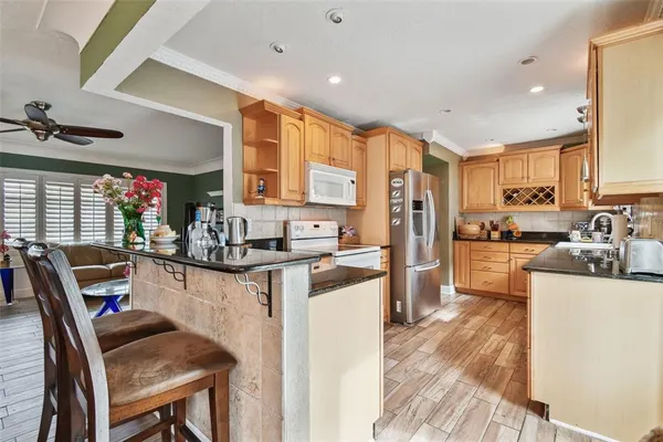 a kitchen with a sink and cabinets