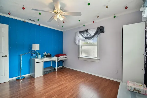 a room that has a couch and a stove in it