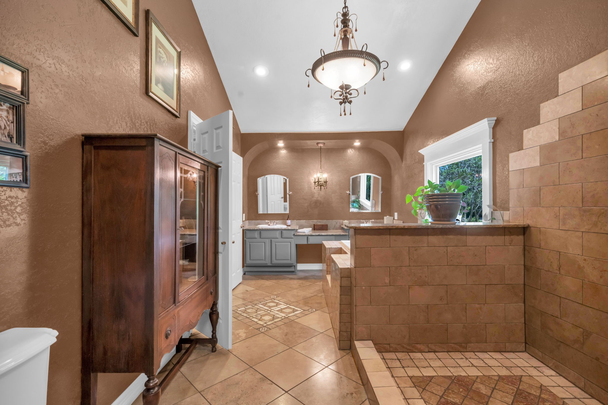 17821 Brown Road Conroe, TX 77306 - Photo 24 of 50 a view of a bathroom with a sink shower and a mirror