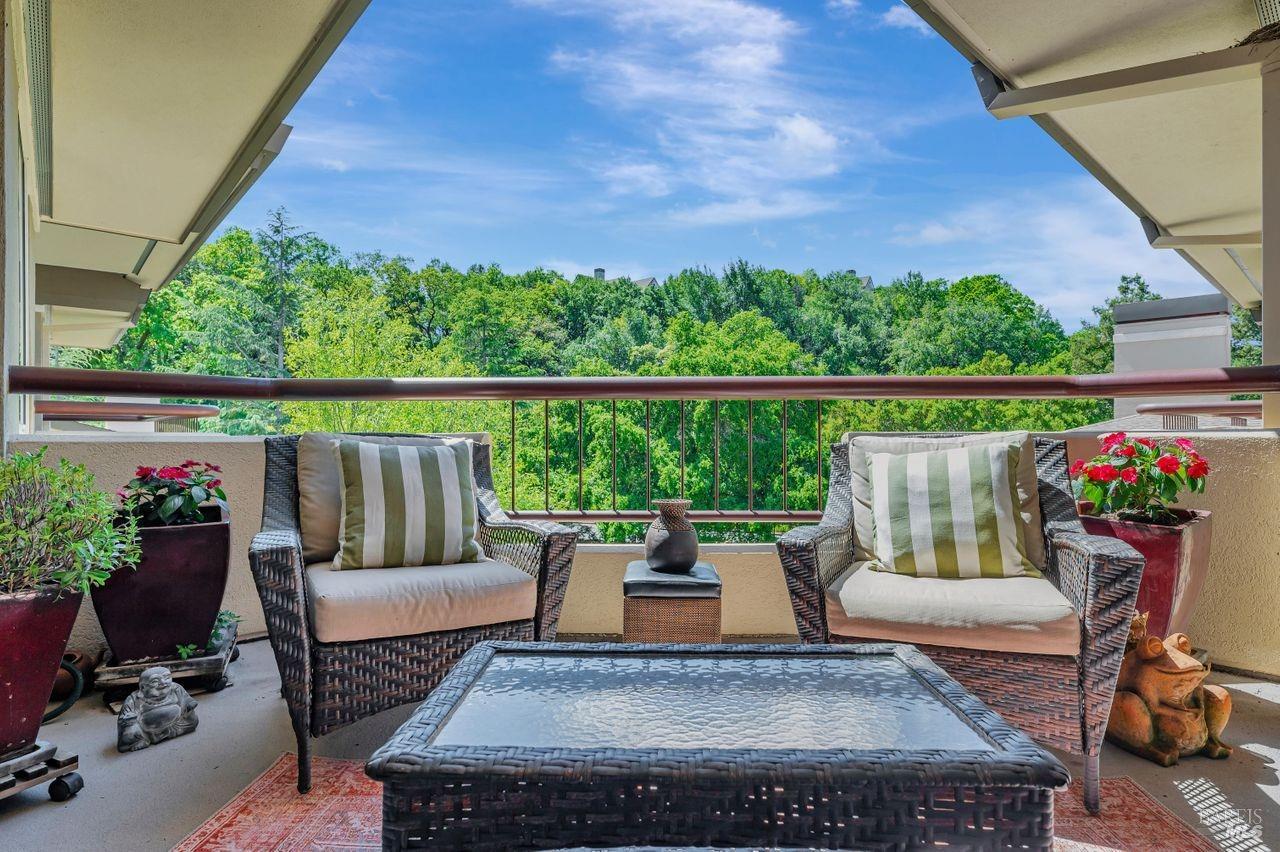 400 Deer Valley Road, Unit 5A San Rafael, CA 94903 - Photo 1 of 1 a view of a patio with couches chairs and potted plants