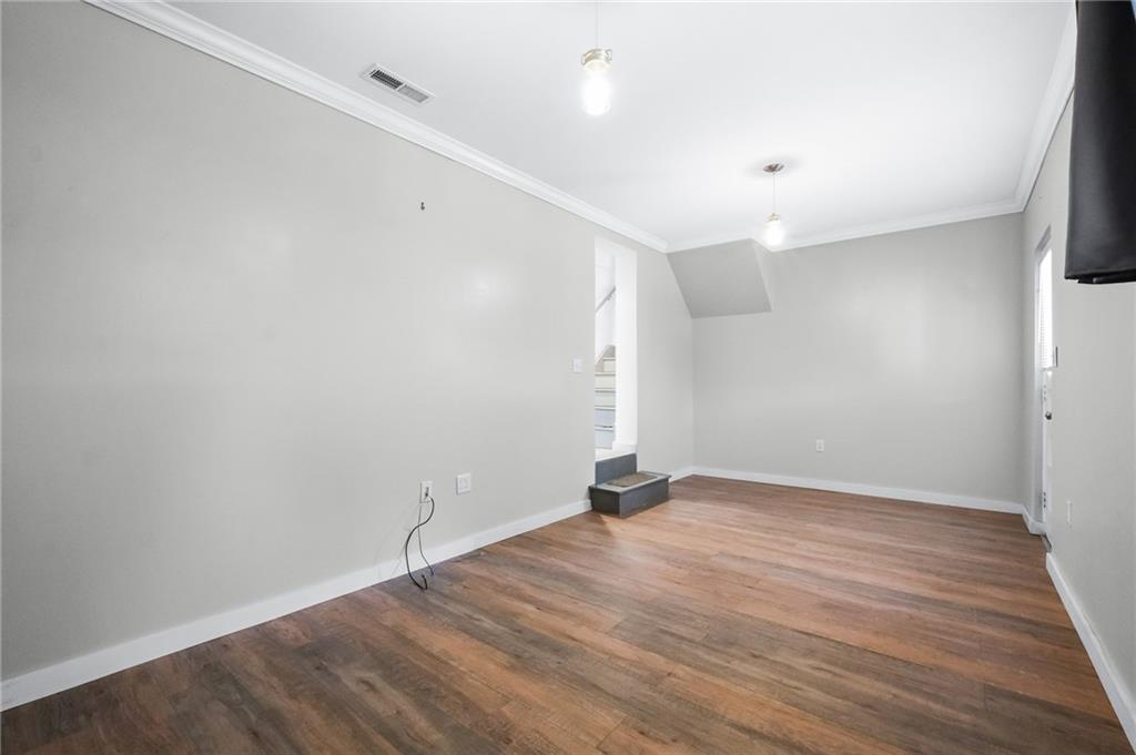 457 Orchard Spring Road Pittsburgh, PA 15220 - Photo 23 of 40 Luxury Vinyl Tile installed in the game room.