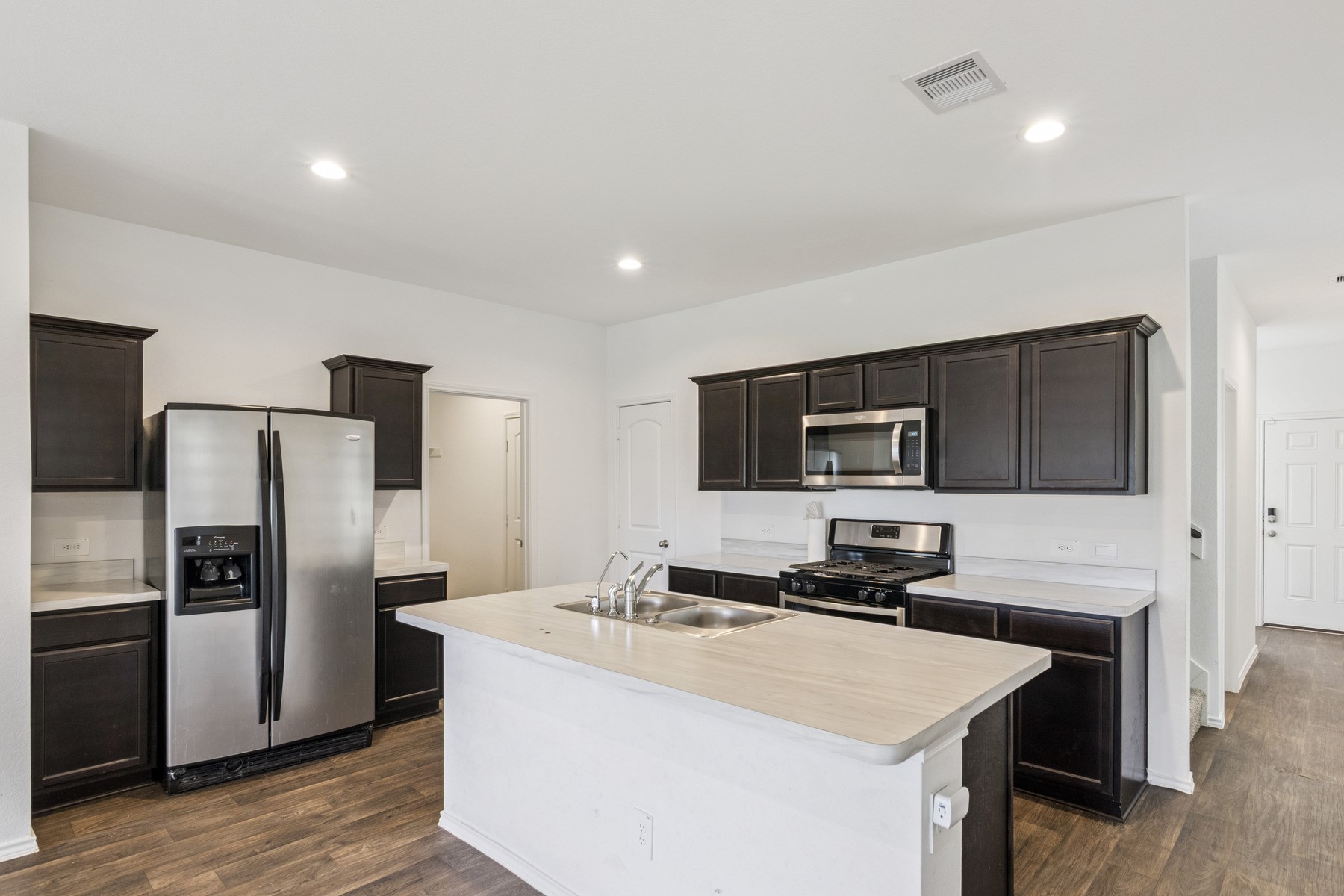 22431 Gilded Peak Lane Spring, TX 77373 - Photo 6 of 18 kitchen area with breakfast bar