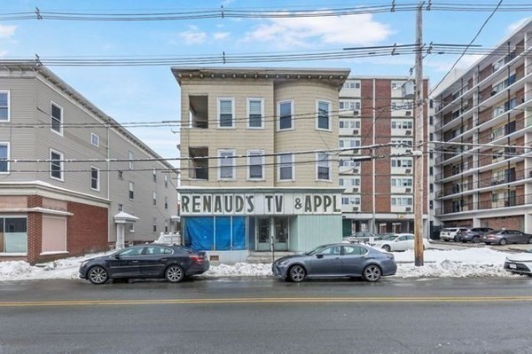 171 Mechanic Street Southbridge, MA 01550 - Photo 1 of 37 a car parked in front of a building
