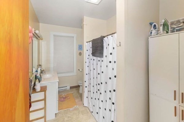 171 Mechanic Street Southbridge, MA 01550 - Photo 11 of 37 a bathroom with a sink toilet and shower
