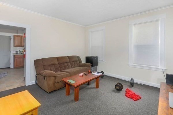 171 Mechanic Street Southbridge, MA 01550 - Photo 15 of 37 a living room with furniture and a couch