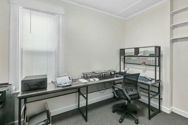 171 Mechanic Street Southbridge, MA 01550 - Photo 20 of 37 a room with a table and chairs