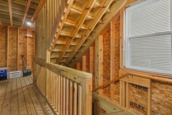 171 Mechanic Street Southbridge, MA 01550 - Photo 21 of 37 a view of a balcony with wooden floor and fence