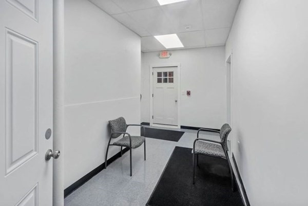 171 Mechanic Street Southbridge, MA 01550 - Photo 28 of 37 a view of a hallway with workspace