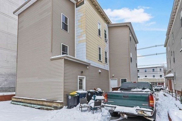 171 Mechanic Street Southbridge, MA 01550 - Photo 34 of 37 a backyard of a house with outdoor seating
