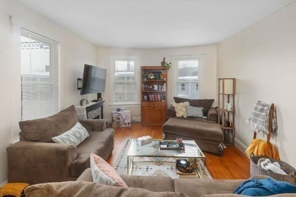 171 Mechanic Street Southbridge, MA 01550 - Photo 5 of 37 a living room with furniture and a flat screen tv